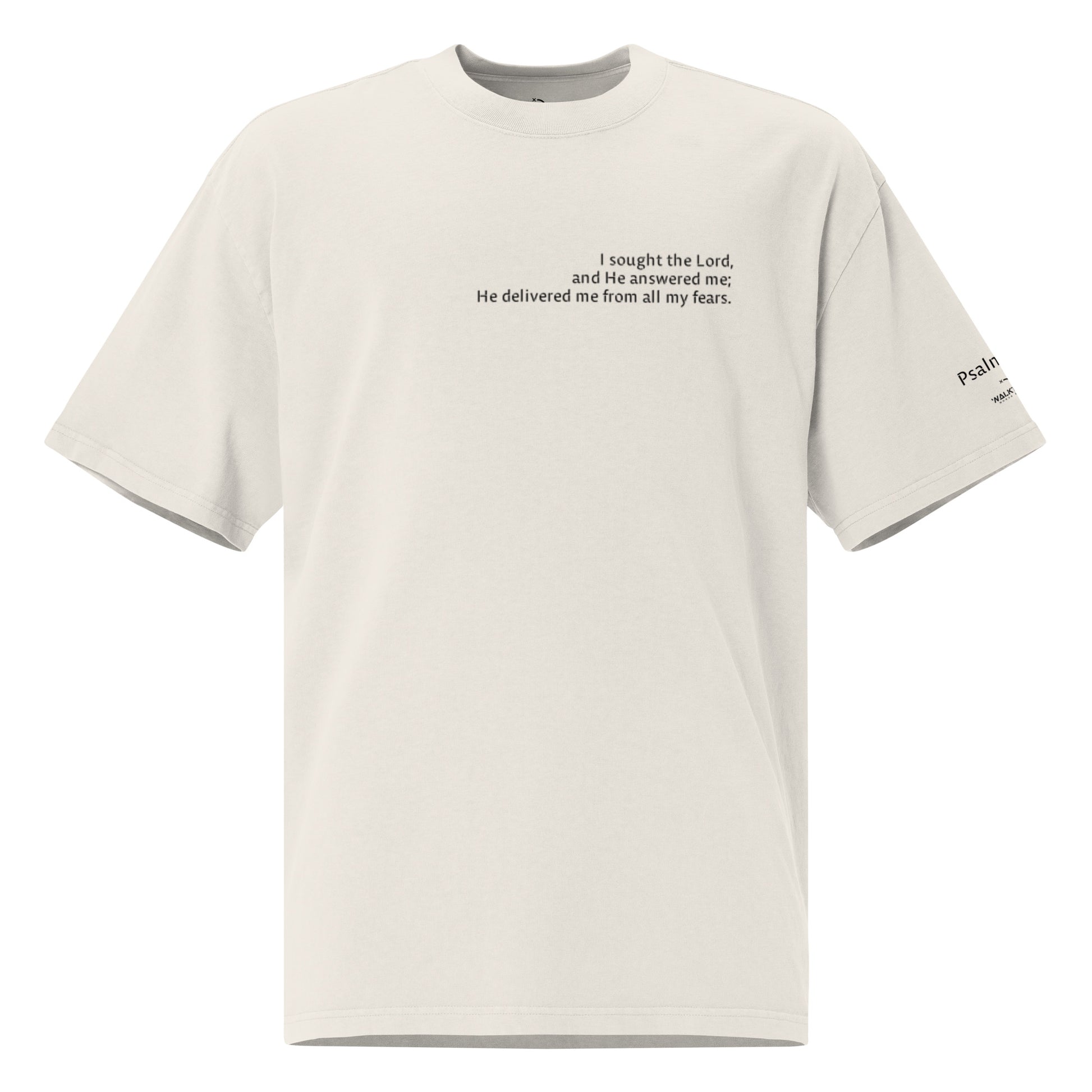 White oversized Christian t-shirt with Psalm 34:4 printed on front and verse reference on left sleeve