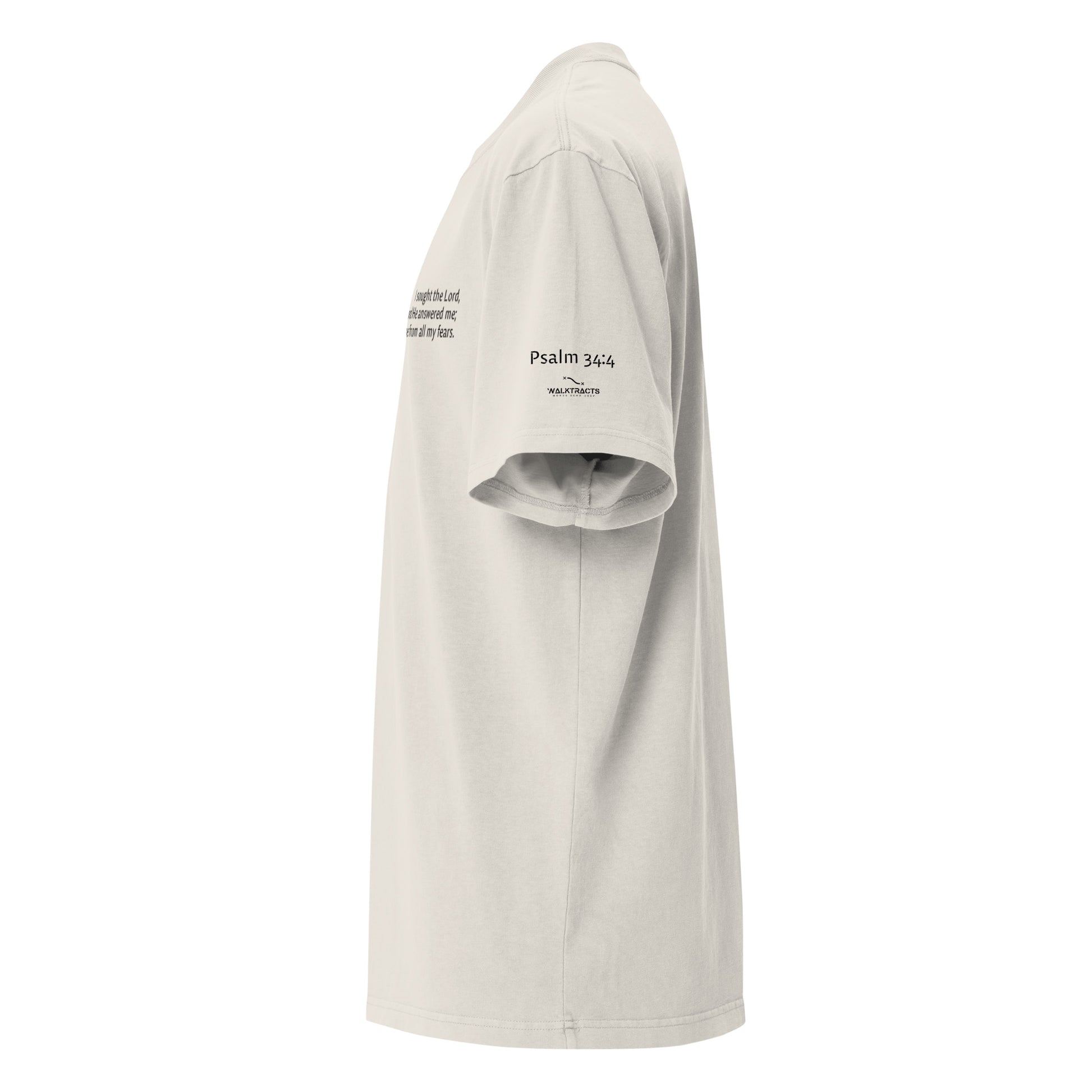 White oversized Christian t-shirt with Psalm 34:4 printed on front and verse reference on left sleeve