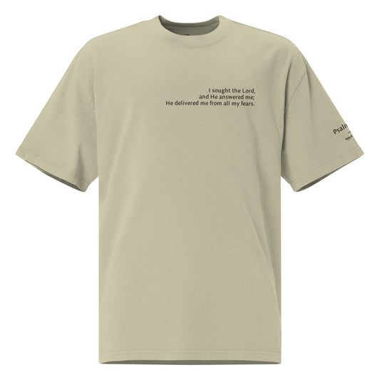 Green oversized Christian t-shirt with Psalm 34:4 printed on front and verse reference on left sleeve