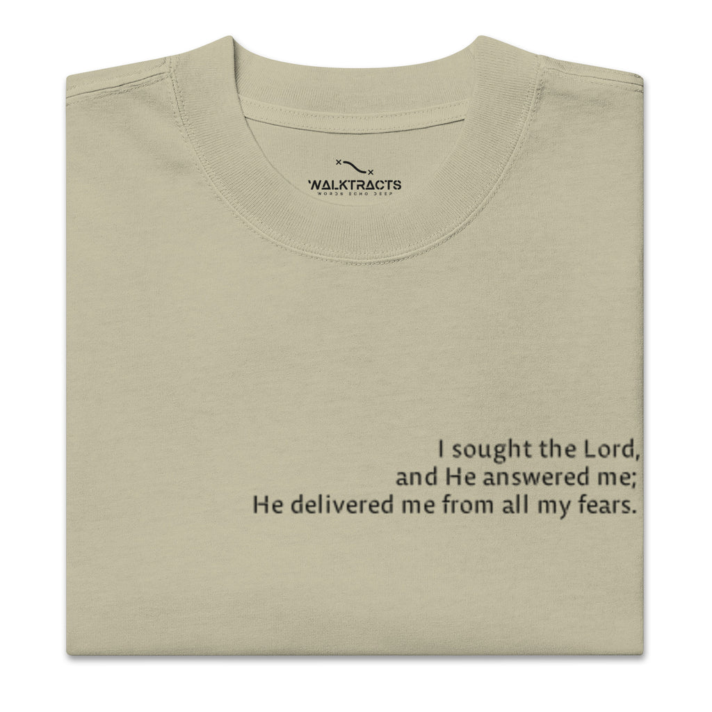 Green oversized Christian t-shirt with Psalm 34:4 printed on front and verse reference on left sleeve