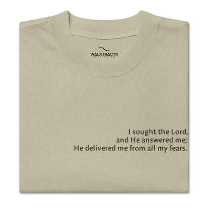 Green oversized Christian t-shirt with Psalm 34:4 printed on front and verse reference on left sleeve