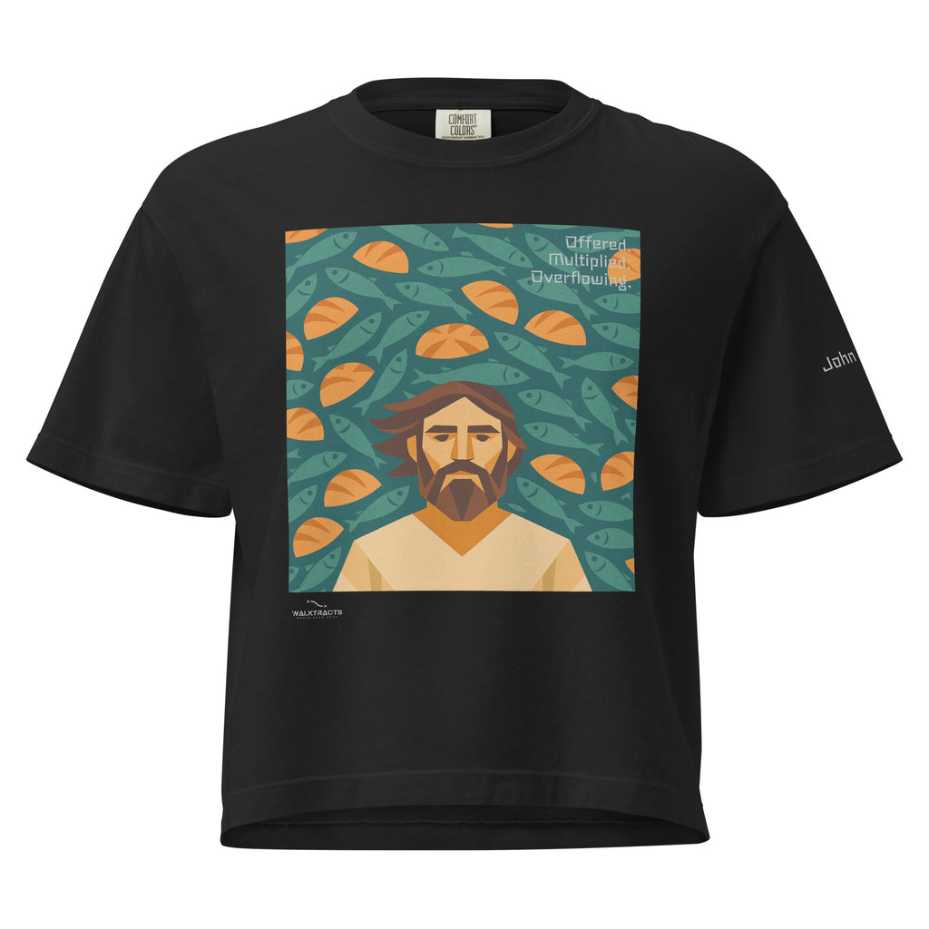 Women's black boxy Christian graphic t-shirt inspired by the 5 loaves and 2 fish story (John 6:9–11), with Bible verse printed on left sleeve
