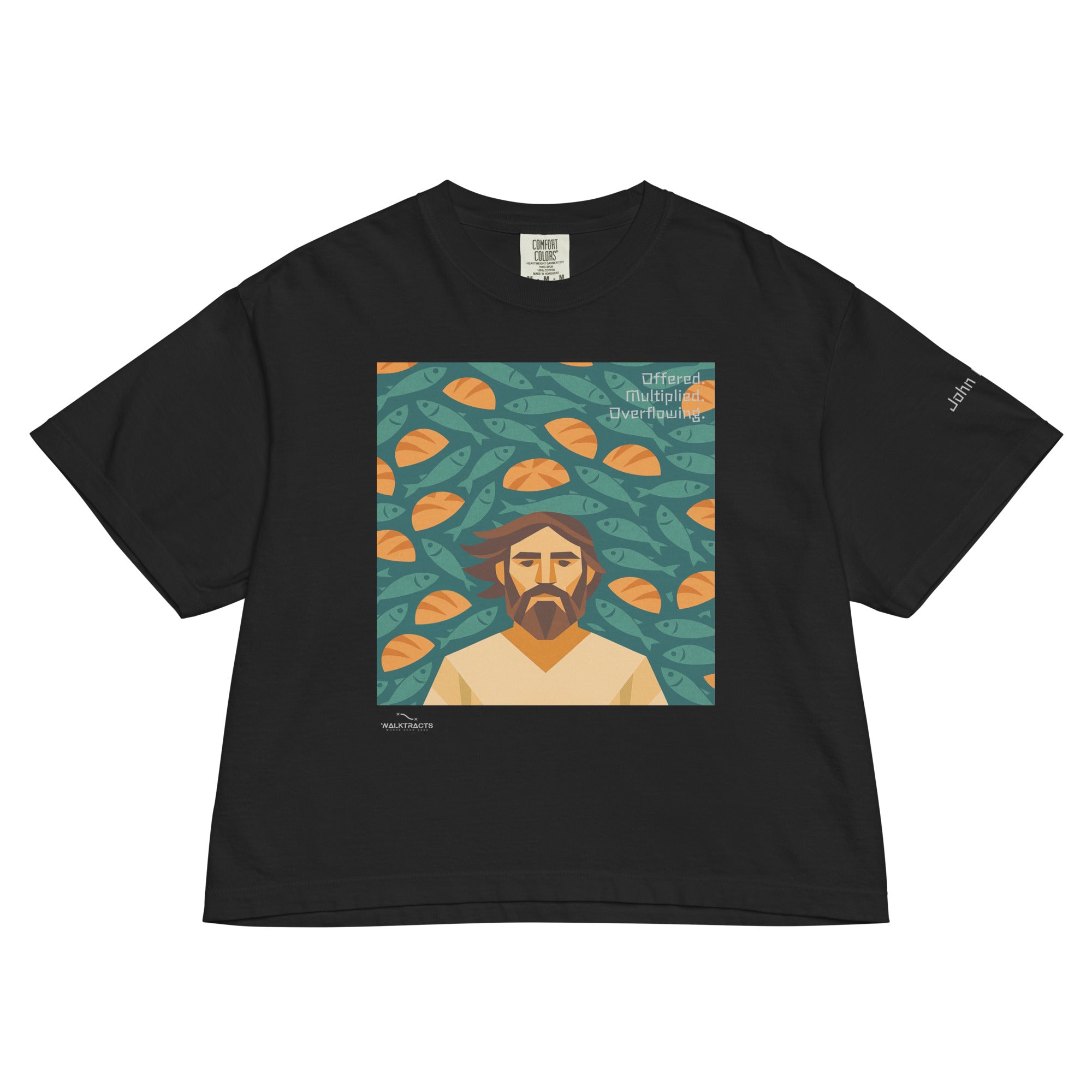 Women's black boxy Christian graphic t-shirt inspired by the 5 loaves and 2 fish story (John 6:9–11), with Bible verse printed on left sleeve