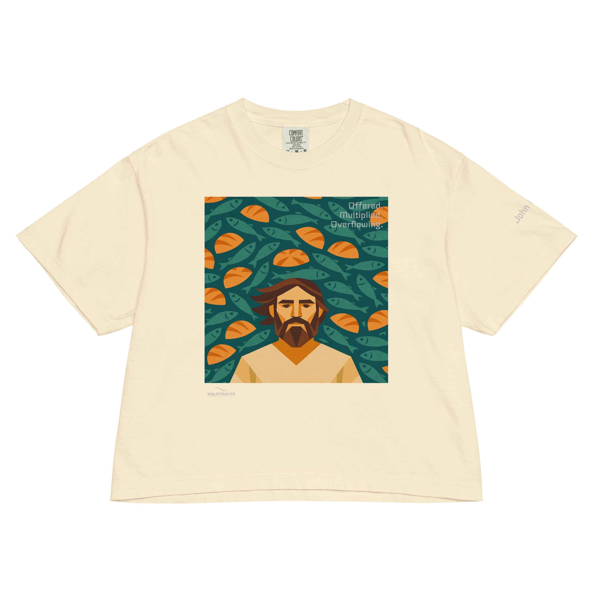 Women's white boxy Christian graphic t-shirt inspired by the 5 loaves and 2 fish story (John 6:9–11), with Bible verse printed on left sleeve