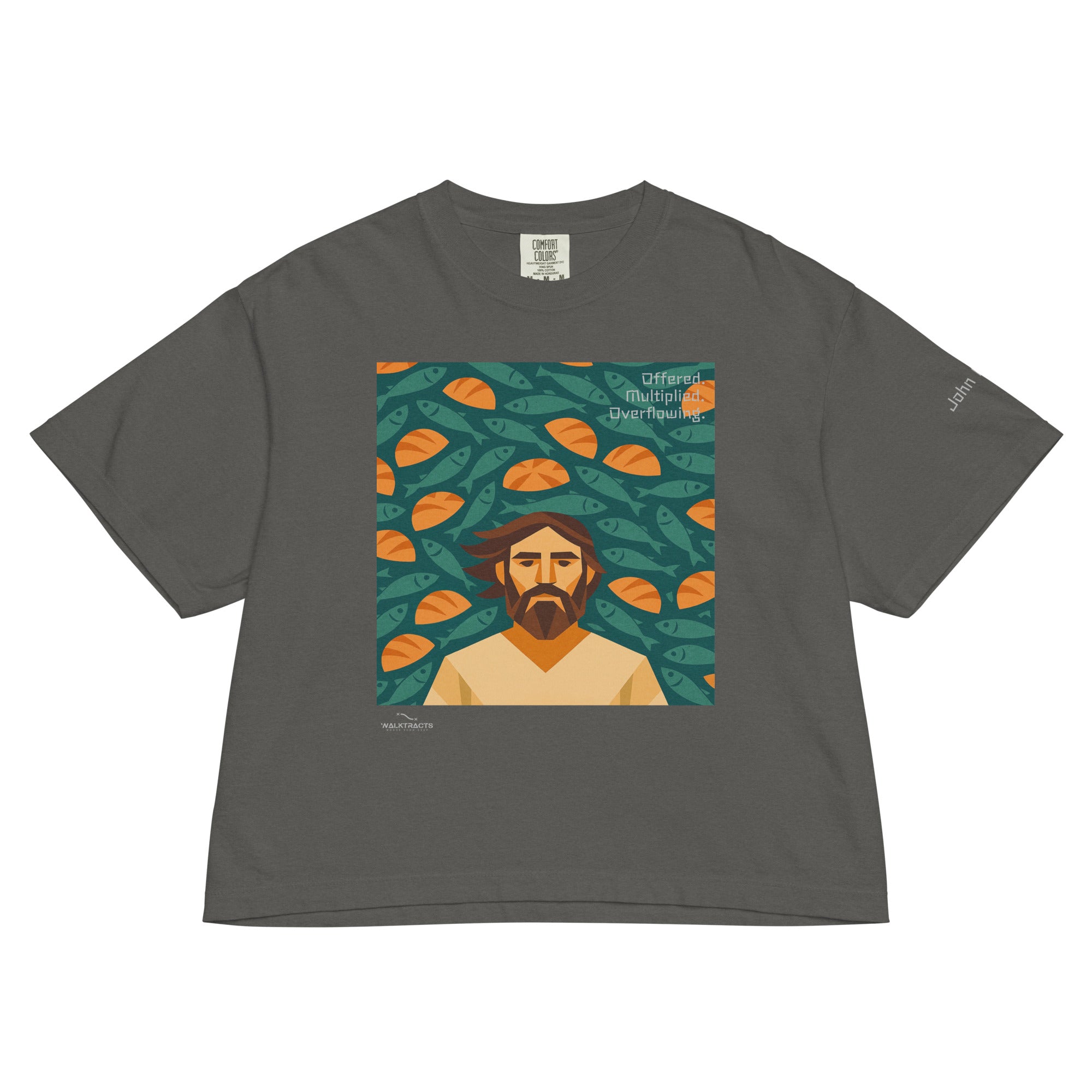 Women's gray boxy Christian graphic t-shirt inspired by the 5 loaves and 2 fish story (John 6:9–11), with Bible verse printed on left sleeve